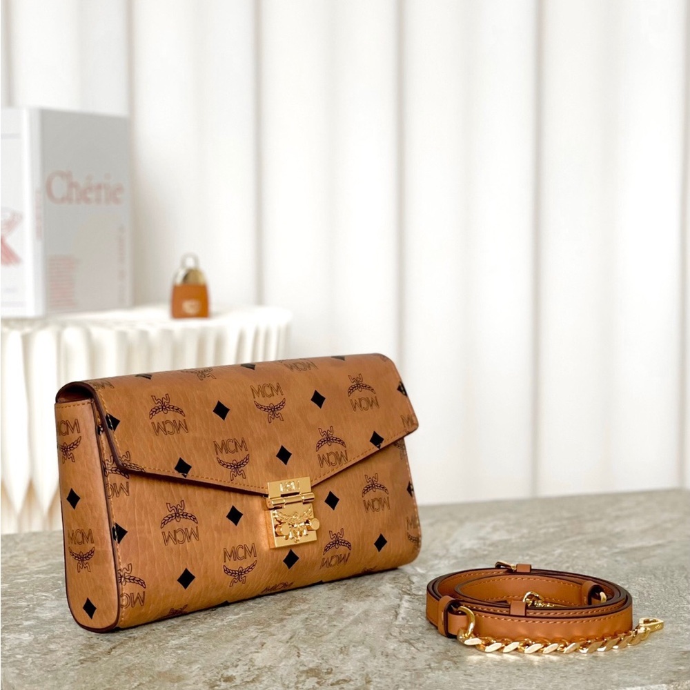 MCM Tan Monogram Clutch with Gold Accent - Picture 9 of 9